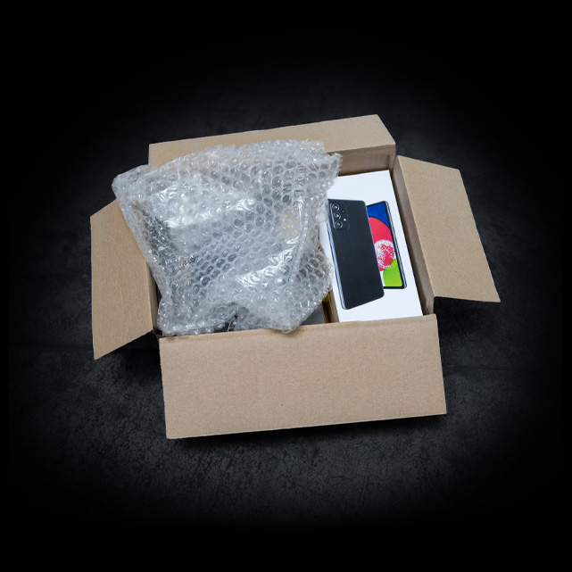 Product protected with plastic bubble wrap in a shipping box