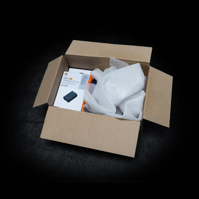 Product packed with plastic foam film as void fill in a shipping box